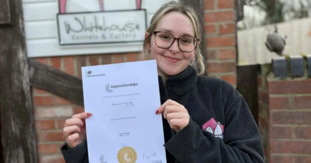 Level 3 Animal Care Apprentice with her certificate achieving a distinction grade